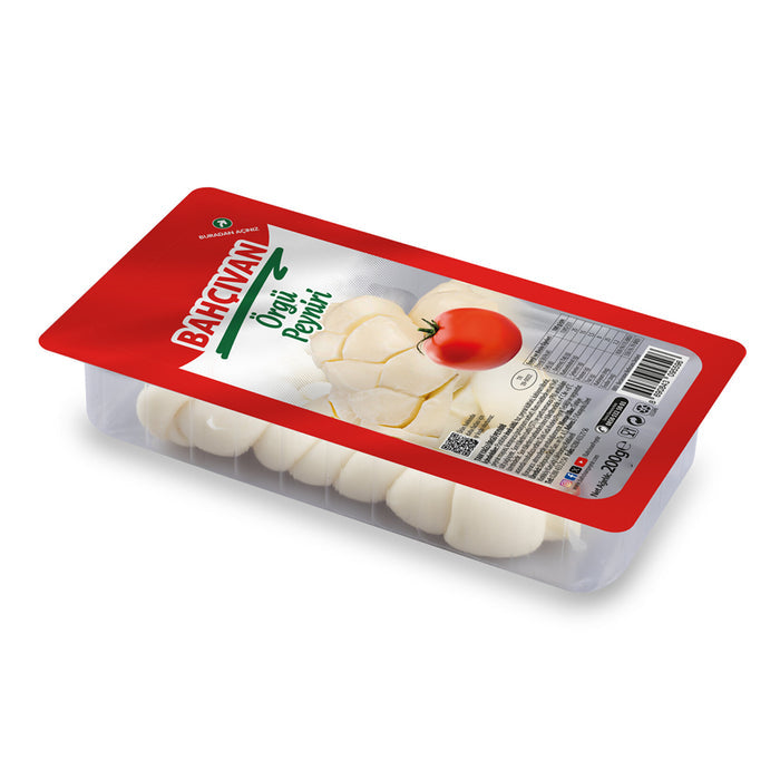 Bahcivan Orgu Peyniri is a traditional Turkish braided cheese known for its firm yet elastic texture and mildly salty, milky flavor.