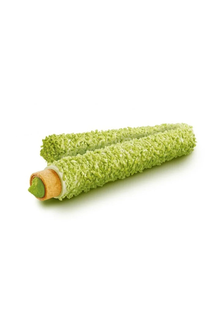 Green rolled Dubai style wafer on a white background